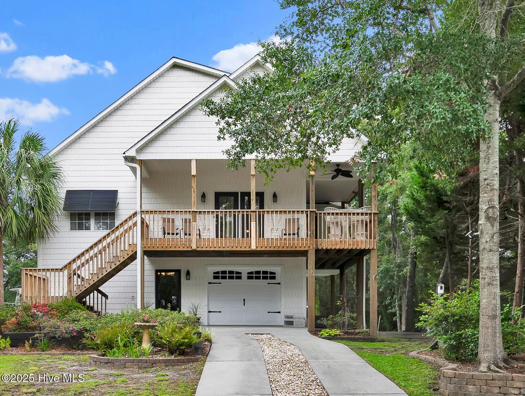Photo of 104 SW 30th Street, Oak Island, NC 28465 (MLS # 100530554)