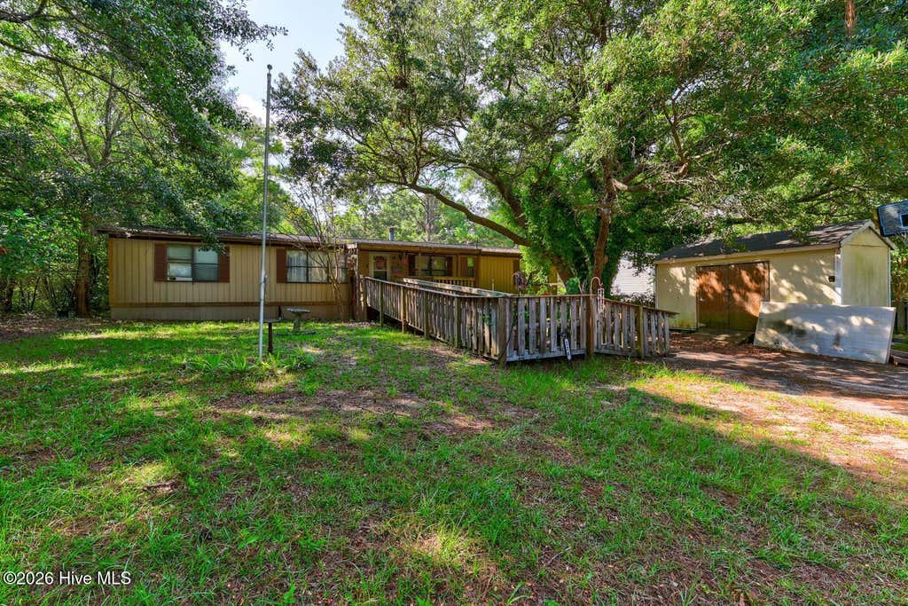 Photo of 226 Dogwood Lane W, Hampstead, NC 28443 (MLS # 100596380)
