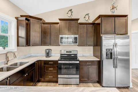 Tiny photo for 144 NW 7th Street, Oak Island, NC 28465 (MLS # 100573959)