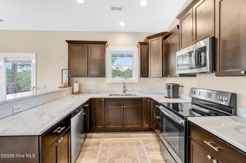 Tiny photo for 144 NW 7th Street, Oak Island, NC 28465 (MLS # 100573959)