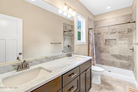 Tiny photo for 144 NW 7th Street, Oak Island, NC 28465 (MLS # 100573959)