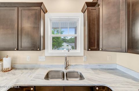 Tiny photo for 144 NW 7th Street, Oak Island, NC 28465 (MLS # 100573959)