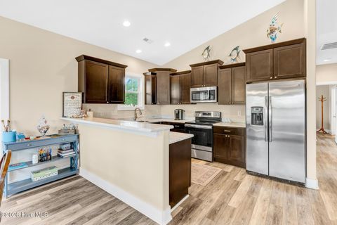 Tiny photo for 144 NW 7th Street, Oak Island, NC 28465 (MLS # 100573959)