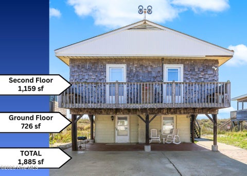 Photo of 223 W Beach Drive, Oak Island, NC 28465 (MLS # 100600878)