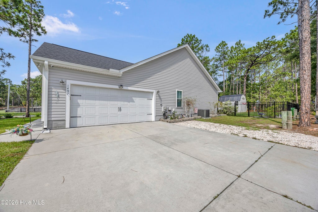 Photo of 1497 E Boiling Spring Road, Southport, NC 28461 (MLS # 100592375)