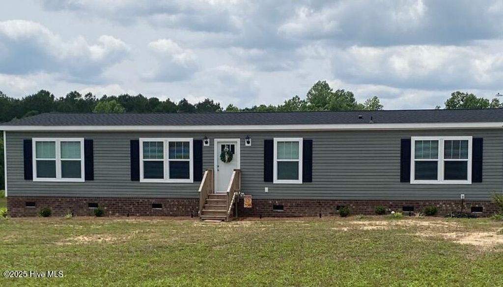 Photo of 1704 Harrelsonville Road, Whiteville, NC 28472 (MLS # 100549278)