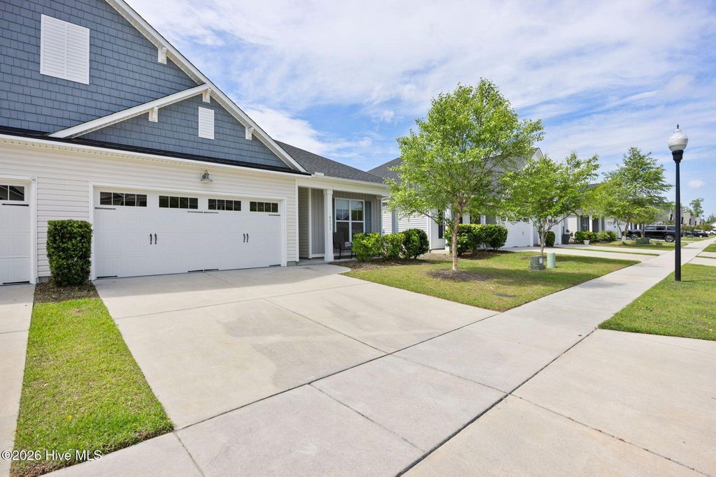 Photo of 6421 Pinnacle Point, Winnabow, NC 28479 (MLS # 100572303)