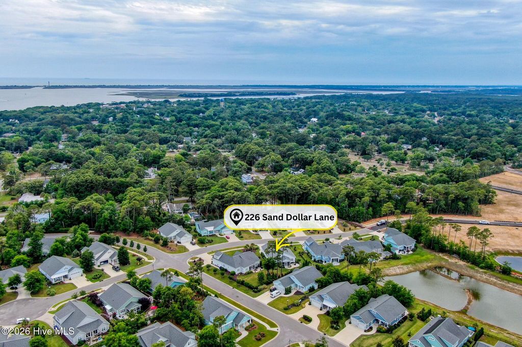 Photo of 226 Sand Dollar Lane, Southport, NC 28461 (MLS # 100553460)