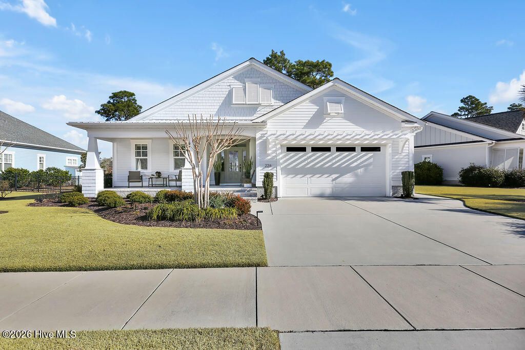 Photo of 226 Sand Dollar Lane, Southport, NC 28461 (MLS # 100553460)