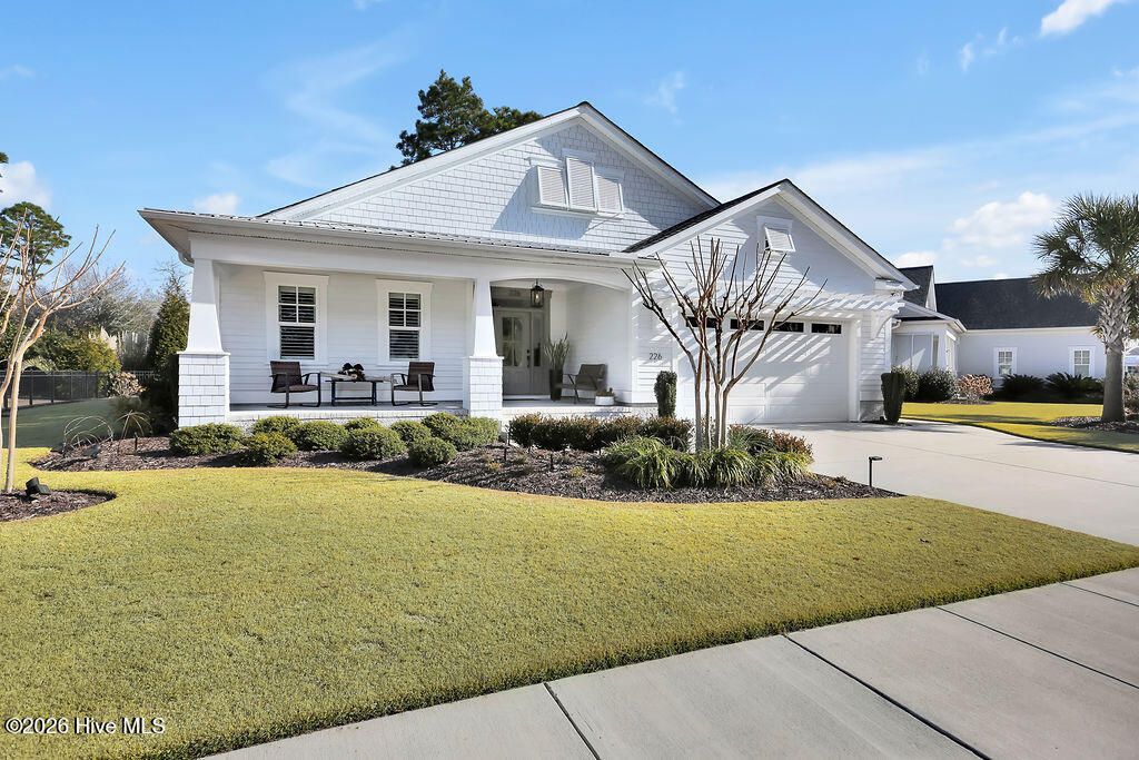 Photo of 226 Sand Dollar Lane, Southport, NC 28461 (MLS # 100553460)