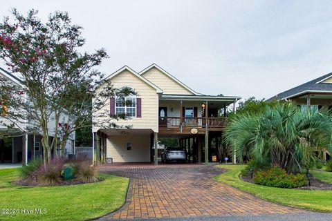 Photo of 113 NW 9th Street, Oak Island, NC 28465 (MLS # 100566076)