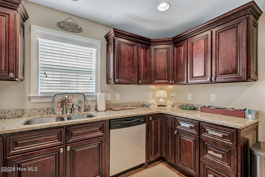 Photo of 113 NW 9th Street, Oak Island, NC 28465 (MLS # 100566076)