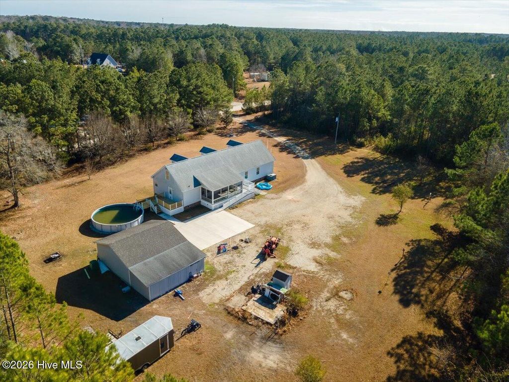 Photo of 153 Porters Ridge Road, Jacksonville, NC 28540 (MLS # 100549997)