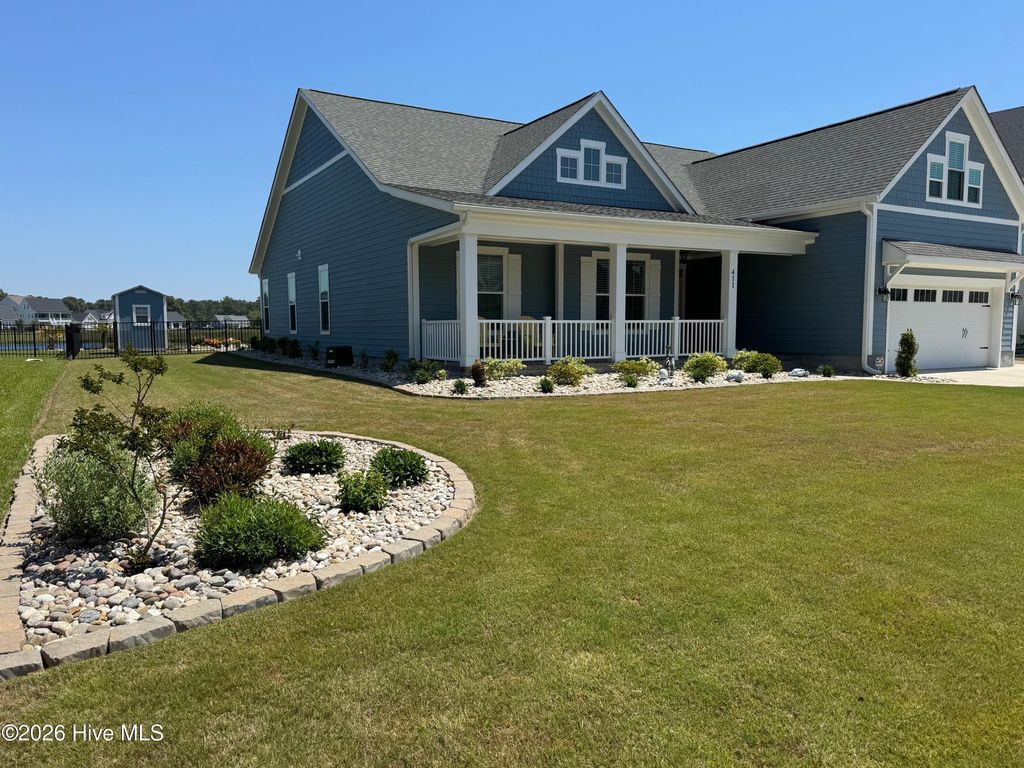 Photo of 411 Summerhouse Drive, Holly Ridge, NC 28445 (MLS # 100569844)