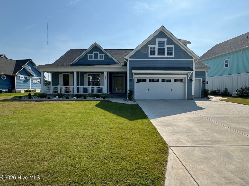 Photo of 411 Summerhouse Drive, Holly Ridge, NC 28445 (MLS # 100569844)