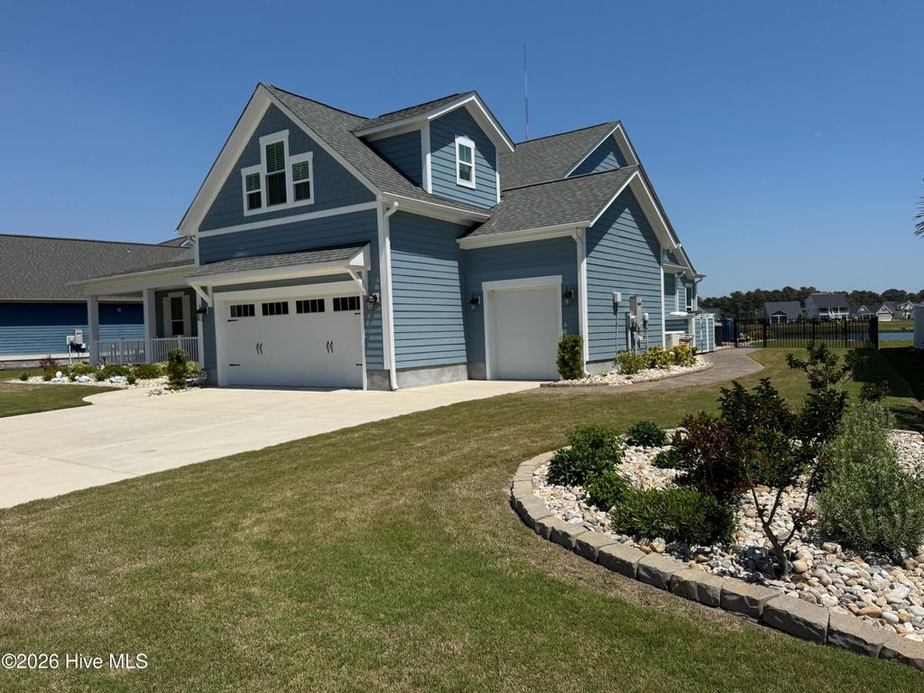 Photo of 411 Summerhouse Drive, Holly Ridge, NC 28445 (MLS # 100569844)