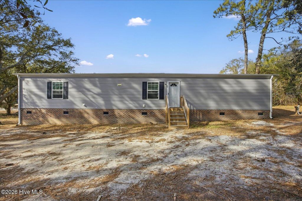 Photo of 104 Sycamore Road, Southport, NC 28461 (MLS # 100549337)