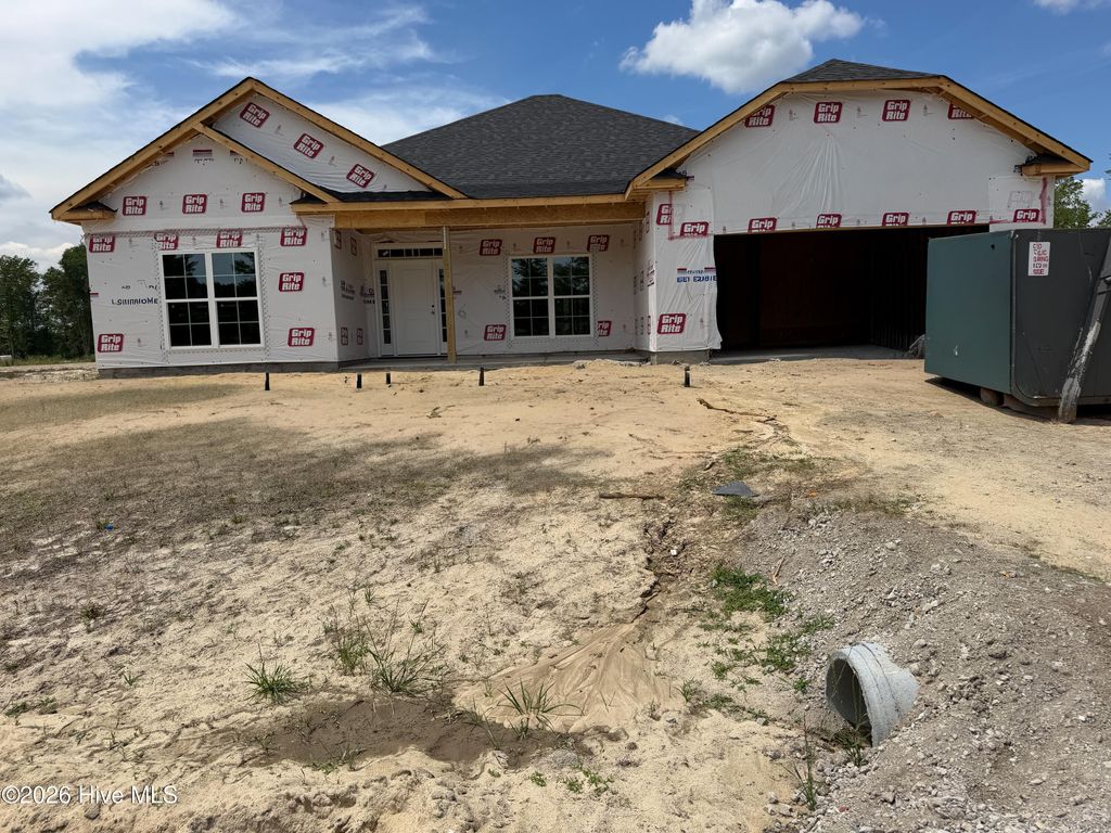 Photo of 1046 Wood Creek Road NE, Leland, NC 28451 (MLS # 100572533)