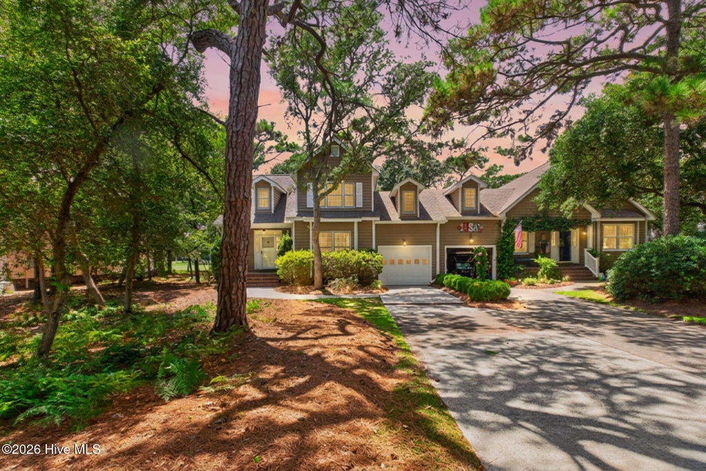 Photo of 105 Oceangreens Lane, Oak Island, NC 28465 (MLS # 100596622)