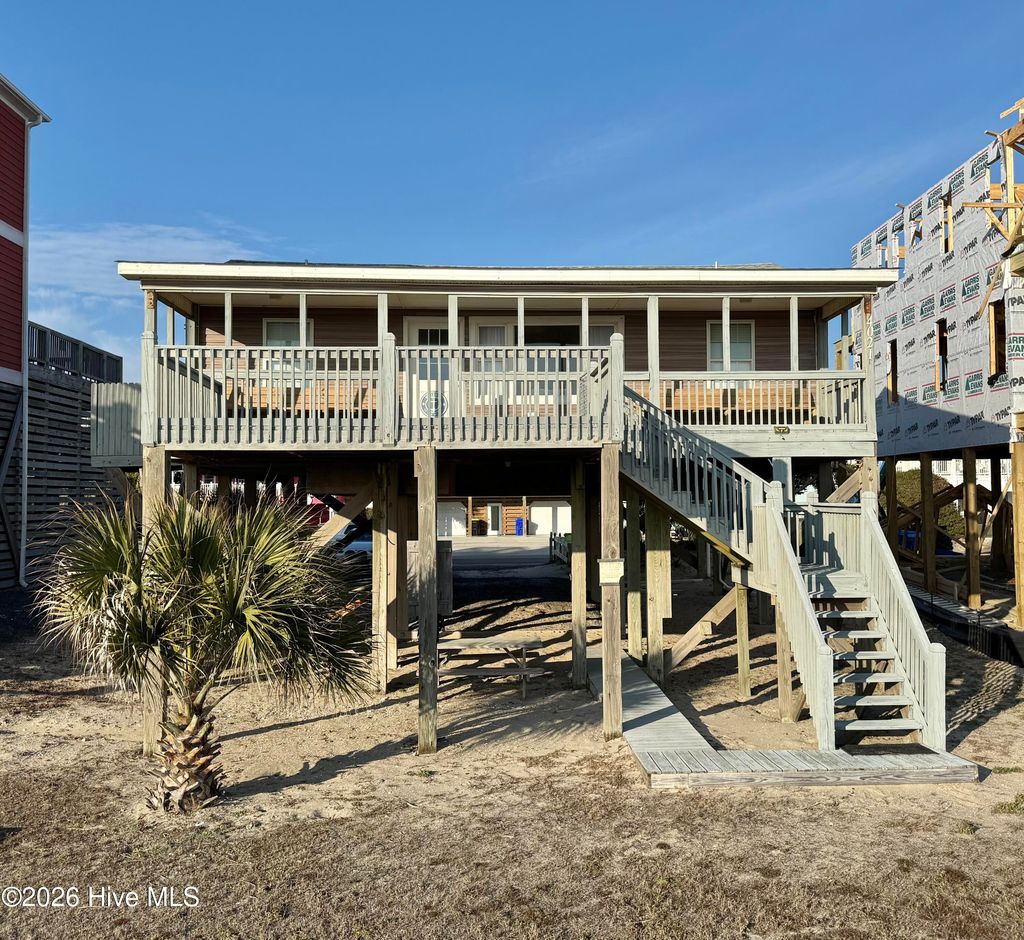 Photo of 4021 E Beach Drive, Oak Island, NC 28465 (MLS # 100548859)