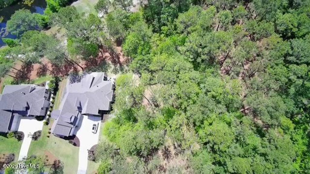 Photo of 6408 Castlebrook Way SW, Ocean Isle Beach, NC 28469 (MLS # 100568114)