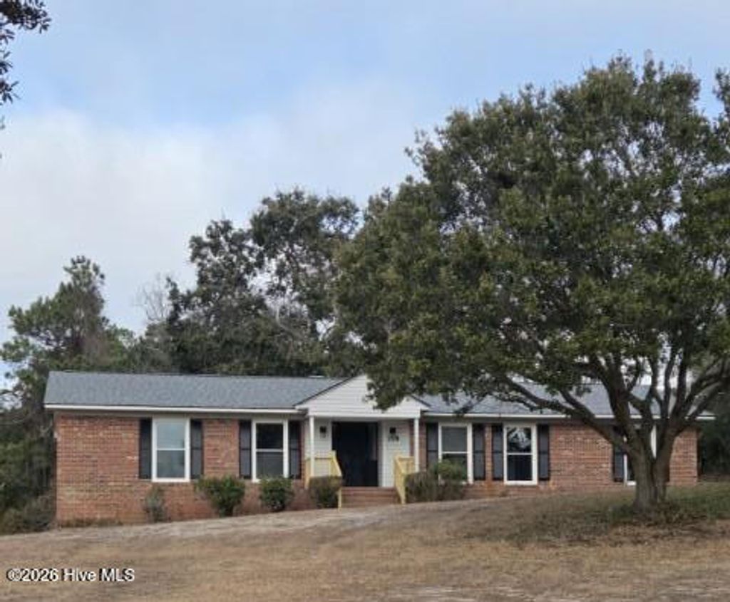 Photo of 718 Hughes Road, Hampstead, NC 28443 (MLS # 100555632)