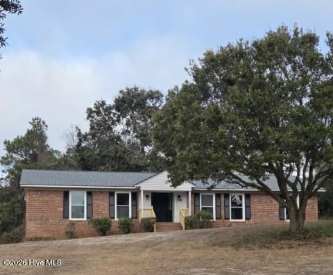 Photo of 718 Hughes Road, Hampstead, NC 28443 (MLS # 100555632)