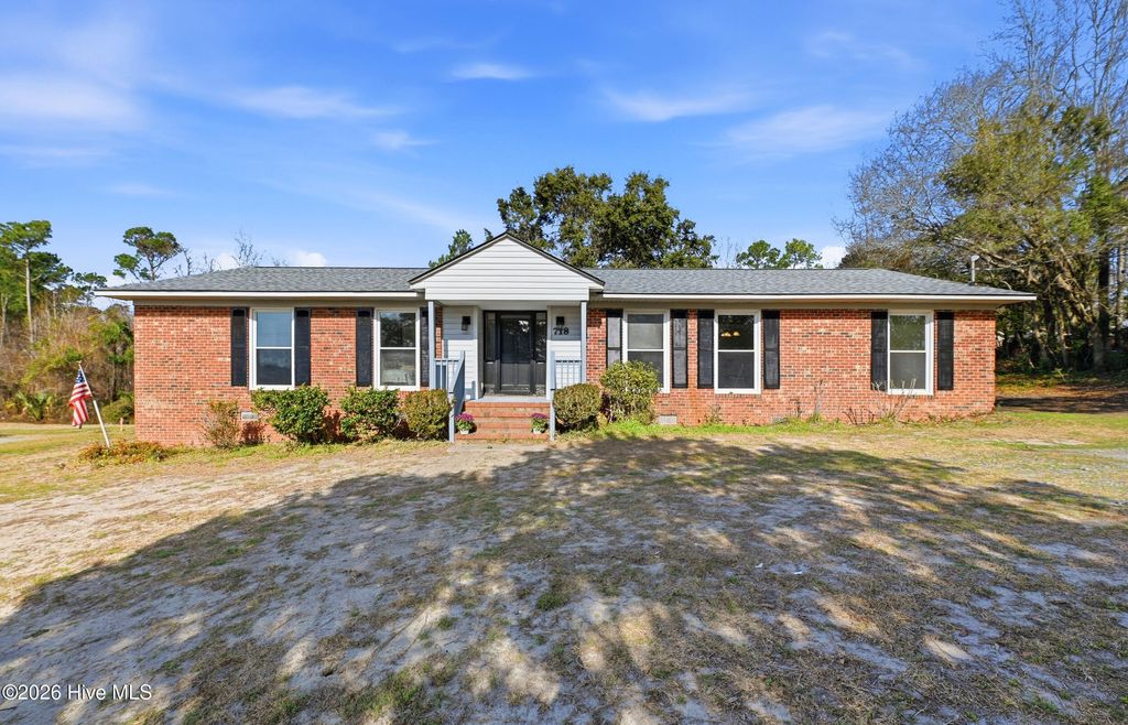 Photo of 718 Hughes Road, Hampstead, NC 28443 (MLS # 100555632)
