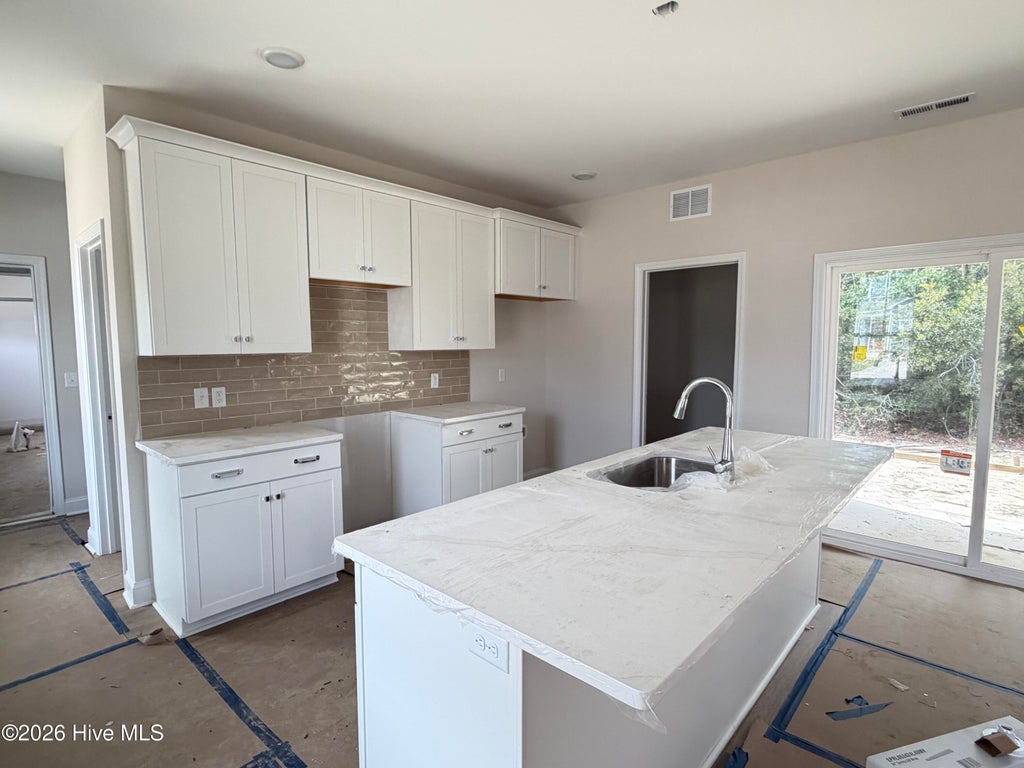 Photo of 176 S Bandwheel Way, Hampstead, NC 28443 (MLS # 100585467)