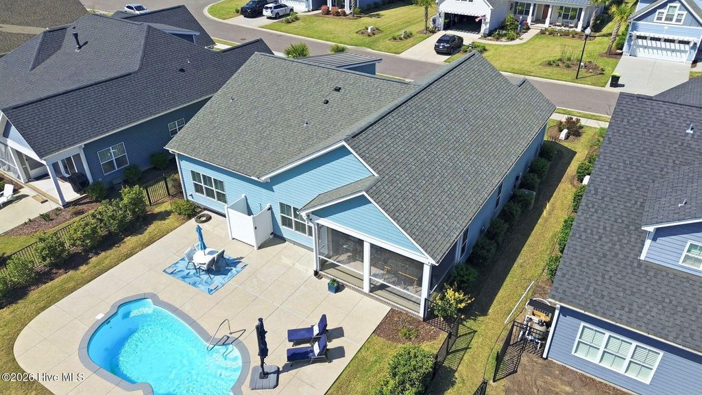 Photo of 6479 Bryson Drive SW, Ocean Isle Beach, NC 28469 (MLS # 100563087)