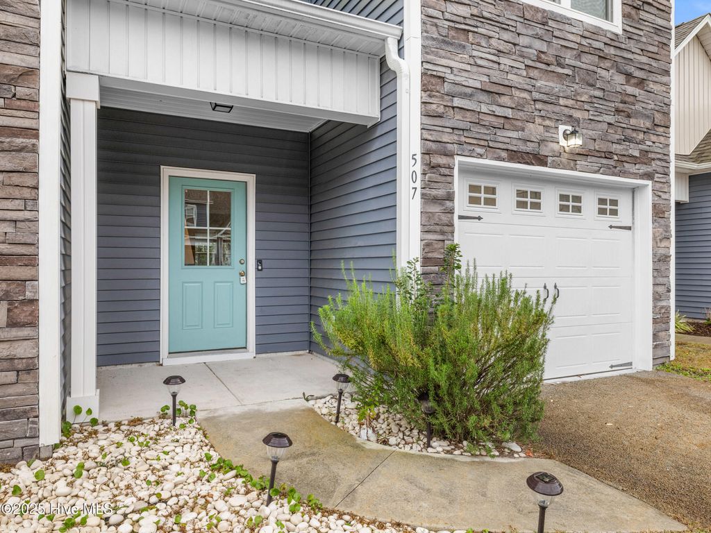 Photo of 507 Stone Crab Lane, Sneads Ferry, NC 28460 (MLS # 100545944)