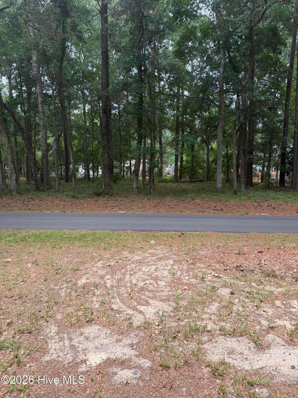 Photo of 9042 Ocean Harbour Golf Club Road SW, Calabash, NC 28467 (MLS # 100591518)