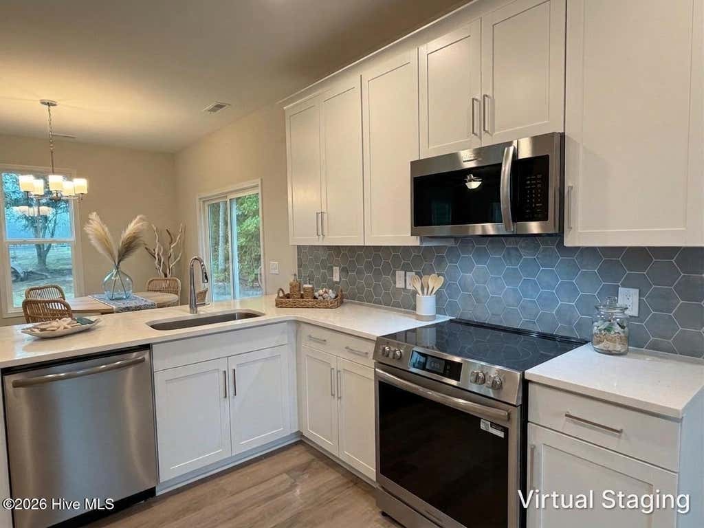 Photo of 40 N Bandwheel Way, Hampstead, NC 28443 (MLS # 100593437)