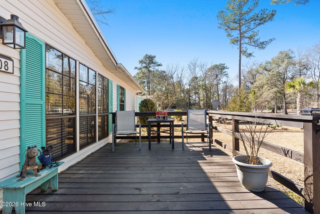 Photo of 308 Ridgewood Drive NW, Calabash, NC 28467 (MLS # 100549816)