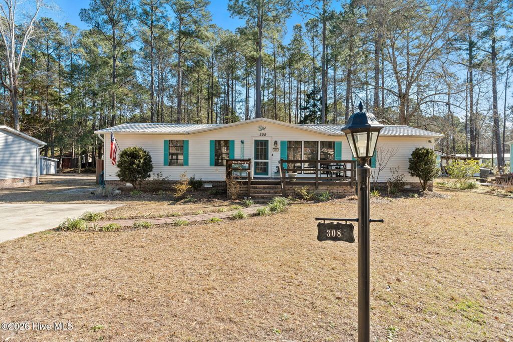 Photo of 308 Ridgewood Drive NW, Calabash, NC 28467 (MLS # 100549816)
