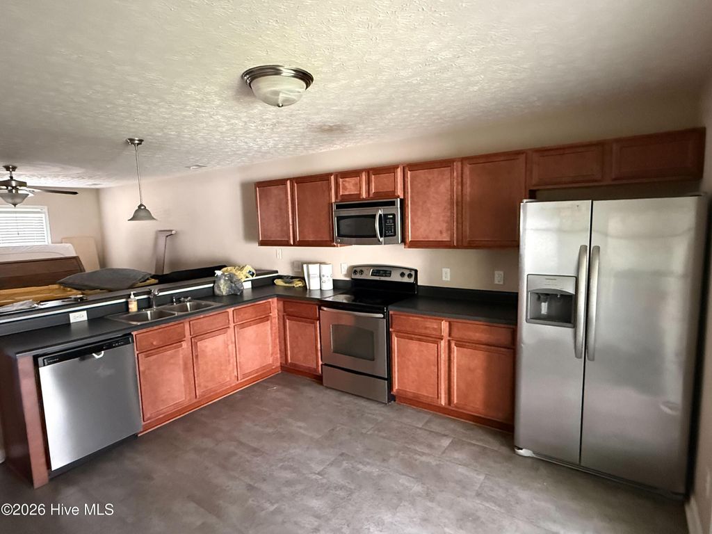 Photo of 407 Falls Cove, Jacksonville, NC 28546 (MLS # 100560090)