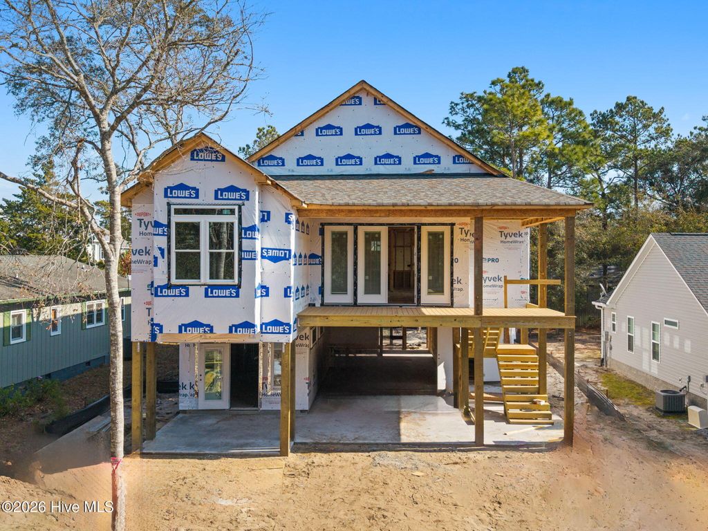 Photo of 210 NE 34th Street, Oak Island, NC 28465 (MLS # 100548785)