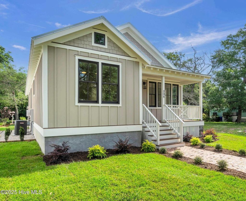 Photo of 308 Fire Fly Lane, Southport, NC 28461 (MLS # 100513991)