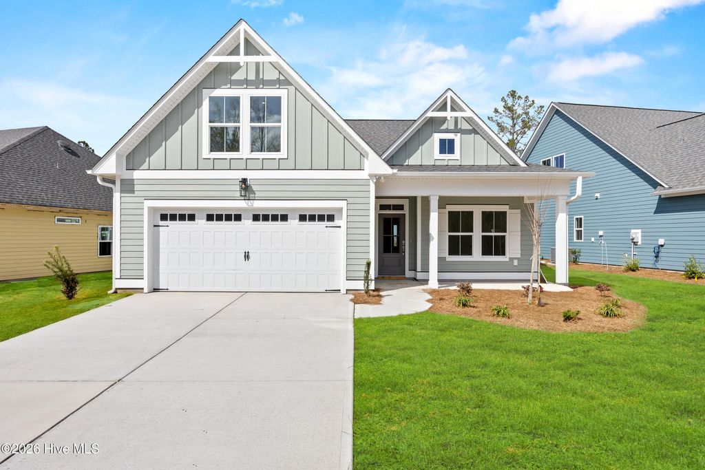 Photo of 7053 Marsh Shore Point, Leland, NC 28451 (MLS # 100561825)