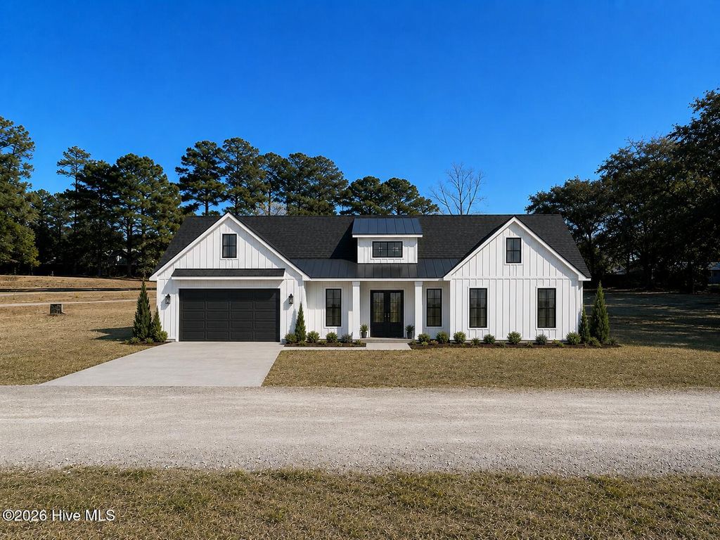 Photo of 1844 Oak Harbor Drive SW, Ocean Isle Beach, NC 28469 (MLS # 100575172)