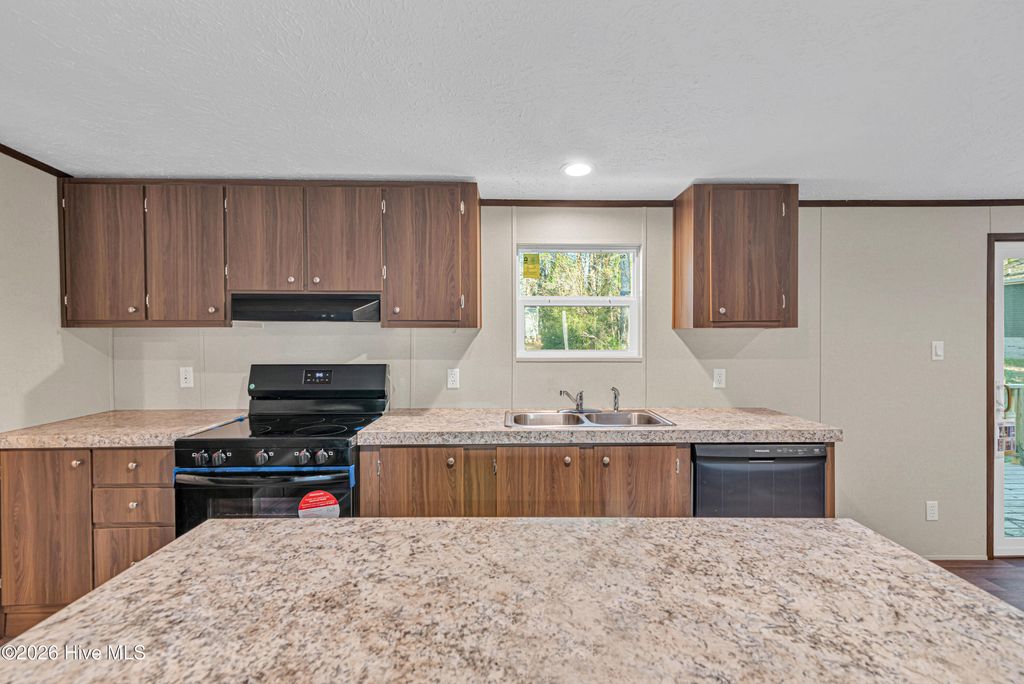 Photo of 724 Gurganus Road, Maple Hill, NC 28454 (MLS # 100561916)