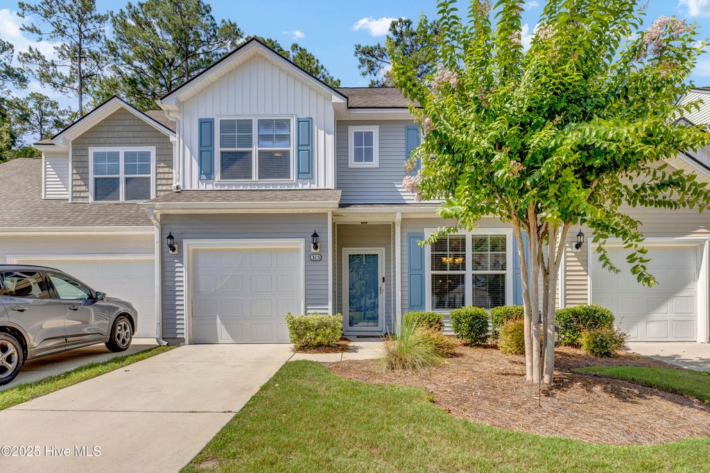 Photo of 315 Bulkhead Bend, Carolina Shores, NC 28467 (MLS # 100516530)