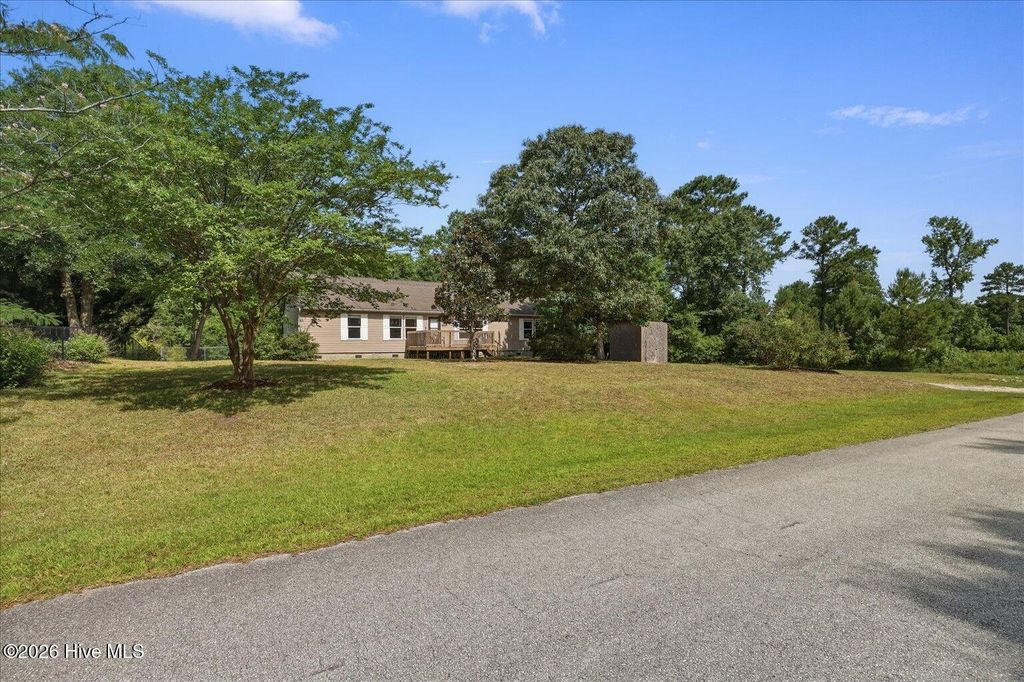 Photo of 7750 Morgan Creek Road SE, Leland, NC 28451 (MLS # 100584510)