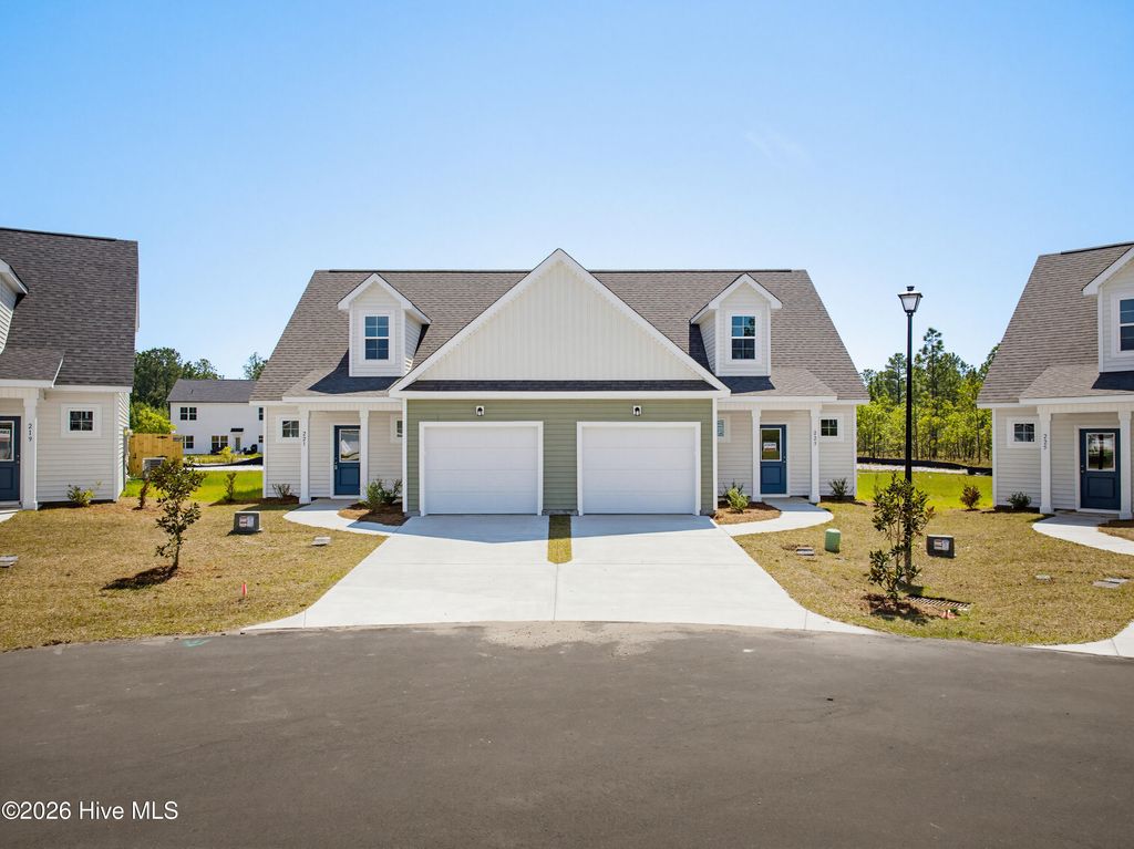 Photo of 221 Sandpiper Place, Holly Ridge, NC 28445 (MLS # 100567408)