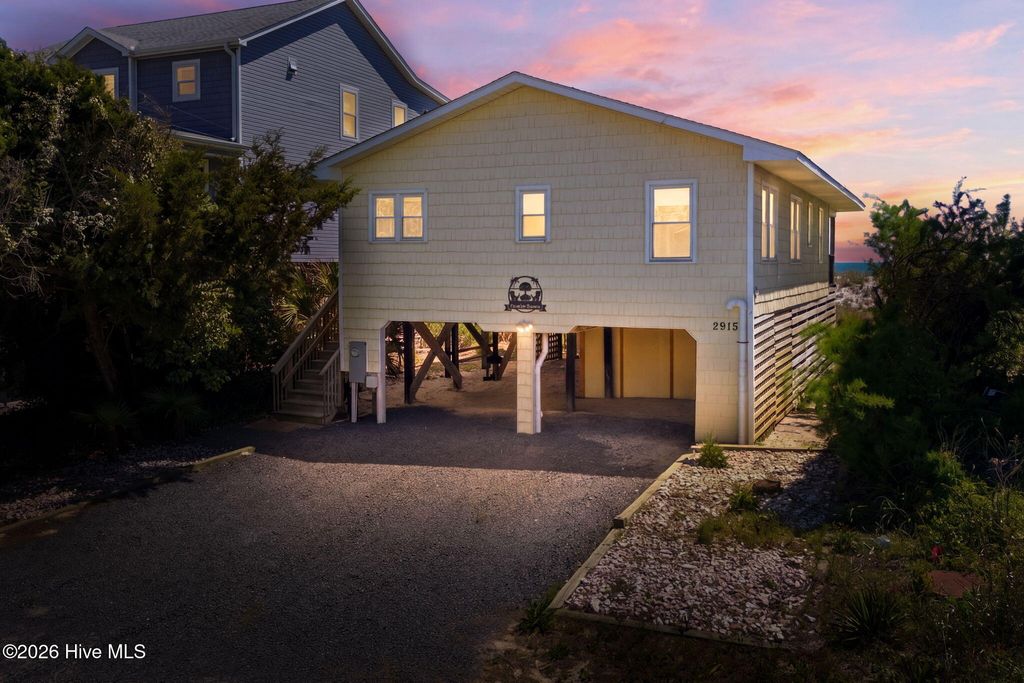 Photo of 2915 E Beach Drive, Oak Island, NC 28465 (MLS # 100568612)