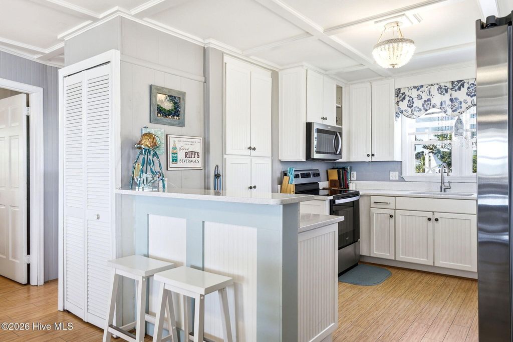 Photo of 2915 E Beach Drive, Oak Island, NC 28465 (MLS # 100568612)