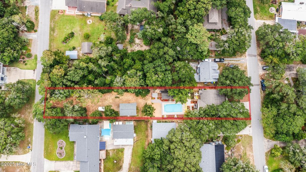 Photo of 104 NE 40th Street, Oak Island, NC 28465 (MLS # 100526521)