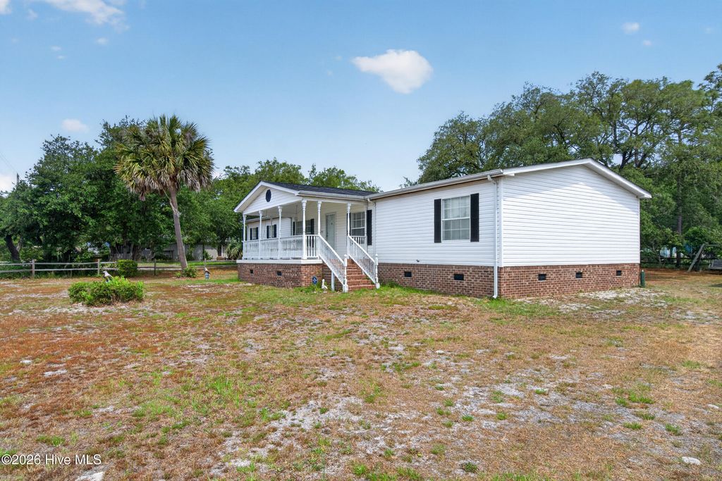 Photo of 4730 Sea Pines Drive SE, Southport, NC 28461 (MLS # 100582051)