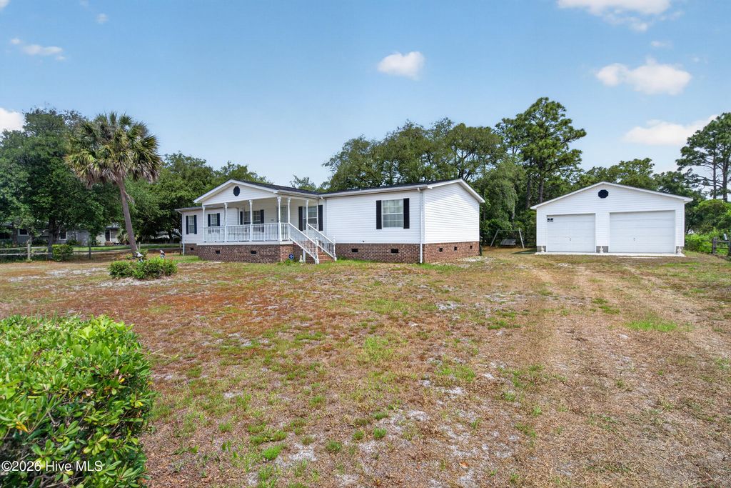 Photo of 4730 Sea Pines Drive SE, Southport, NC 28461 (MLS # 100582051)