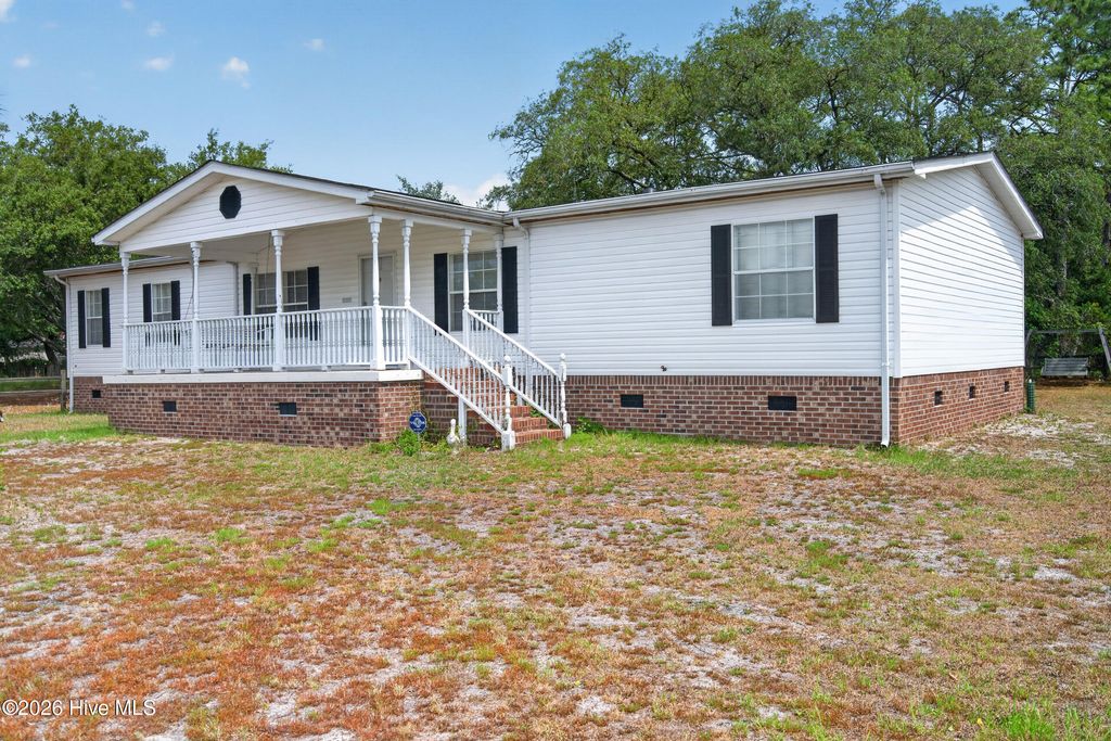 Photo of 4730 Sea Pines Drive SE, Southport, NC 28461 (MLS # 100582051)